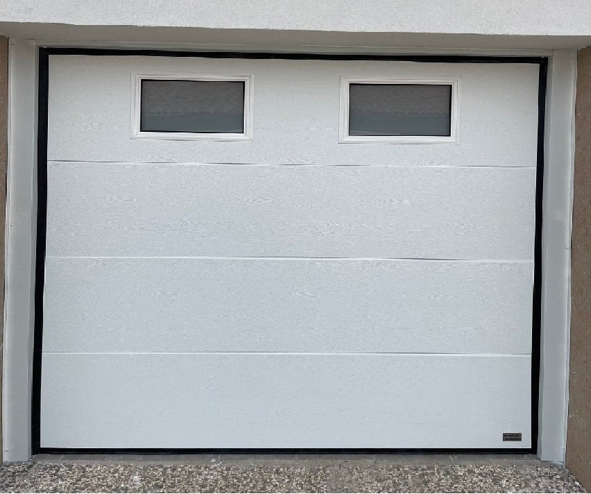 PUERTA GARAJE BLANCA EN VALENCIA